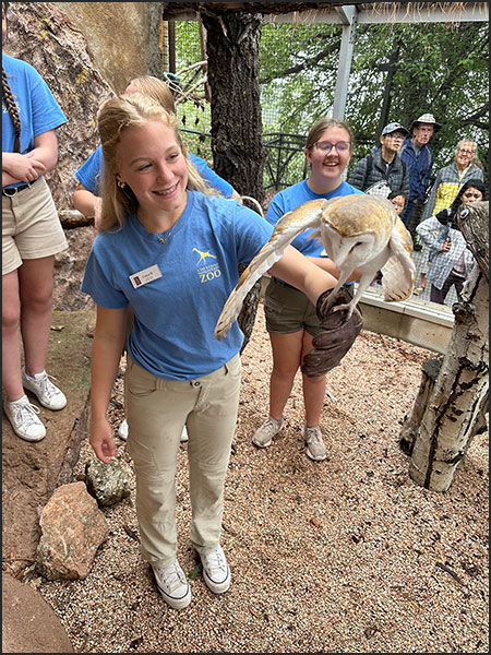 Teen Summer Program participant with barn owl Hoosier